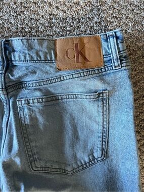 Calvin Klein Light Blue Straight-Leg Men's Jeans with Leather CK Patch